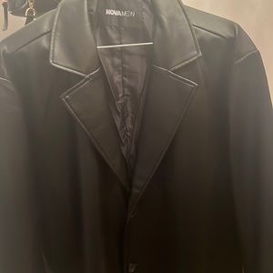 Selling in brand new condition Mens size xxl blk faux leather long dress coat